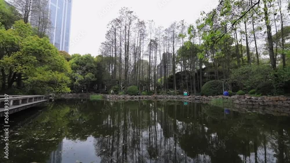 SHANGHAI, CHINA - APRIL 04, 2019: Traditional Chinese men's entertainment in city park. Slow Motion Footage. SHANGHAI, CHINA - APRIL 04, 2019: Traditional Chinese men's entertainment in city park. Slow Motion Footage.