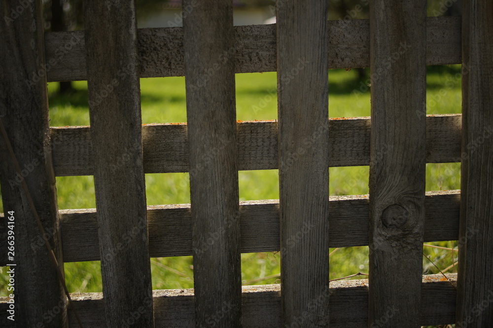 Wooden fence, rhombuses and squares. Texture of white old boards. Wooden fence, rhombuses and squares. Texture of white old boards.