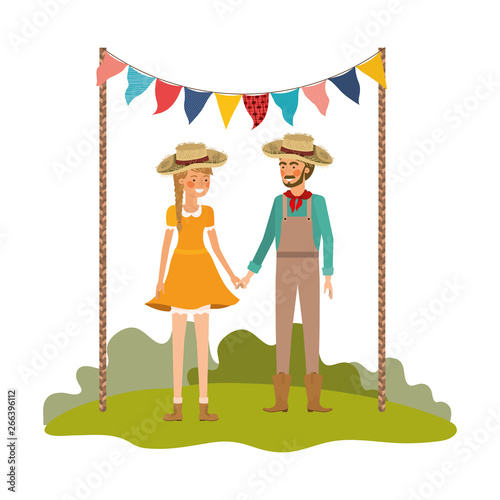 farmers couple talking with straw hat in landscape