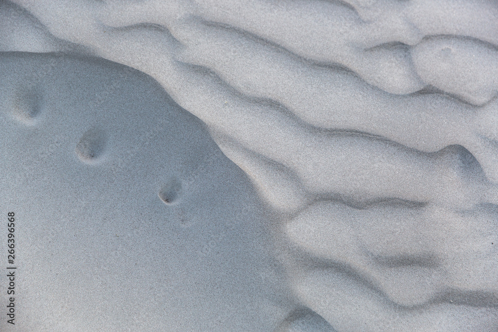© Jovo Jovanovic/Stocksy - Sand dunes in a desert © Jovo Jovanovic/Stocksy - Sand dunes in a desert