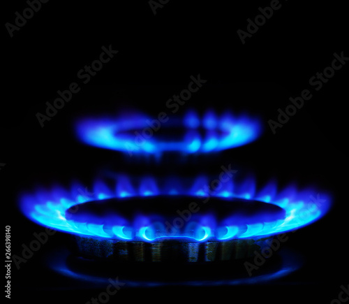 flames of gas stove in the dark