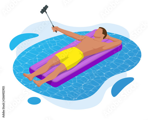 Inflatable ring and mattress. Young man on air mattress in the big swimming pool. Summer holiday idyllic. Enjoying suntan. Vacation concept. High view from above.