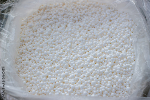 White nitrogen fertilizer in bag photo