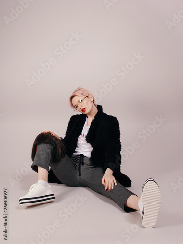 Casual fashionable woman in studio photo