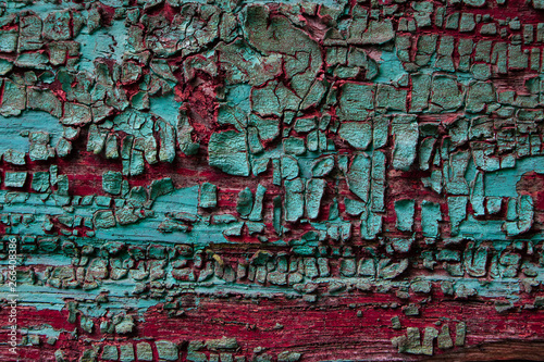 Old shabby wooden surface with cracked color paint, texture, aquamarine 