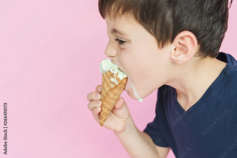 A Boy With Dripping Ice Cream Cone A Boy With Dripping Ice Cream Cone
