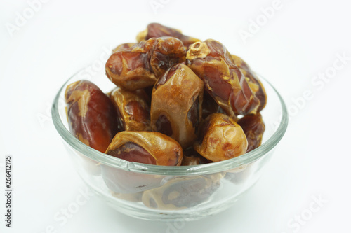 Kurma or dates fruits isolated on white background