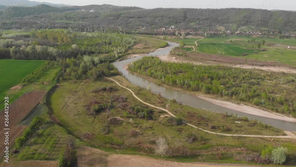 Aerial drone shot of a river and the hills surrounding it Aerial drone shot of a river and the hills surrounding it