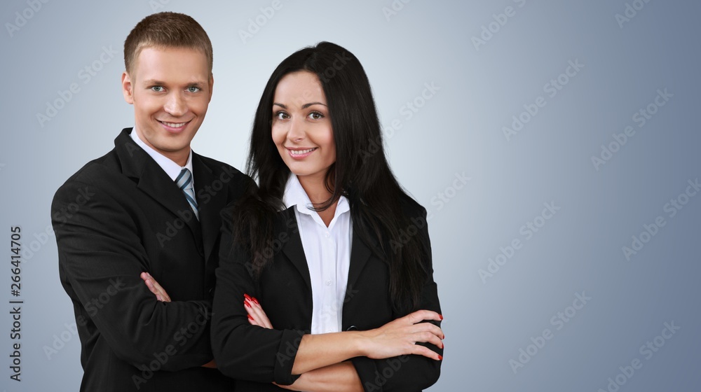 Confident young Business couple with crossed hands on background Confident young Business couple with crossed hands on background