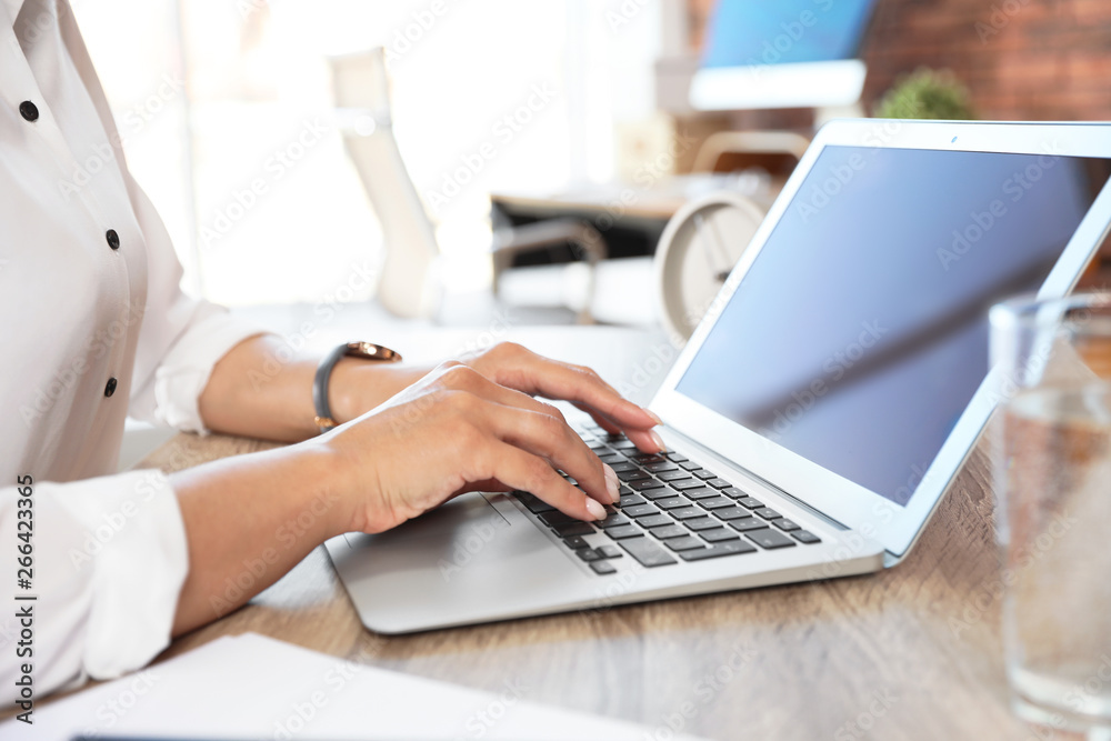 Woman using video chat on laptop in home office, closeup. Space for text Woman using video chat on laptop in home office, closeup. Space for text