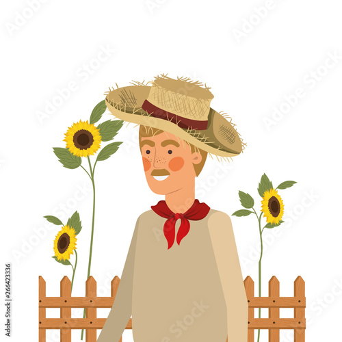 man farmer with straw hat and sunflowers