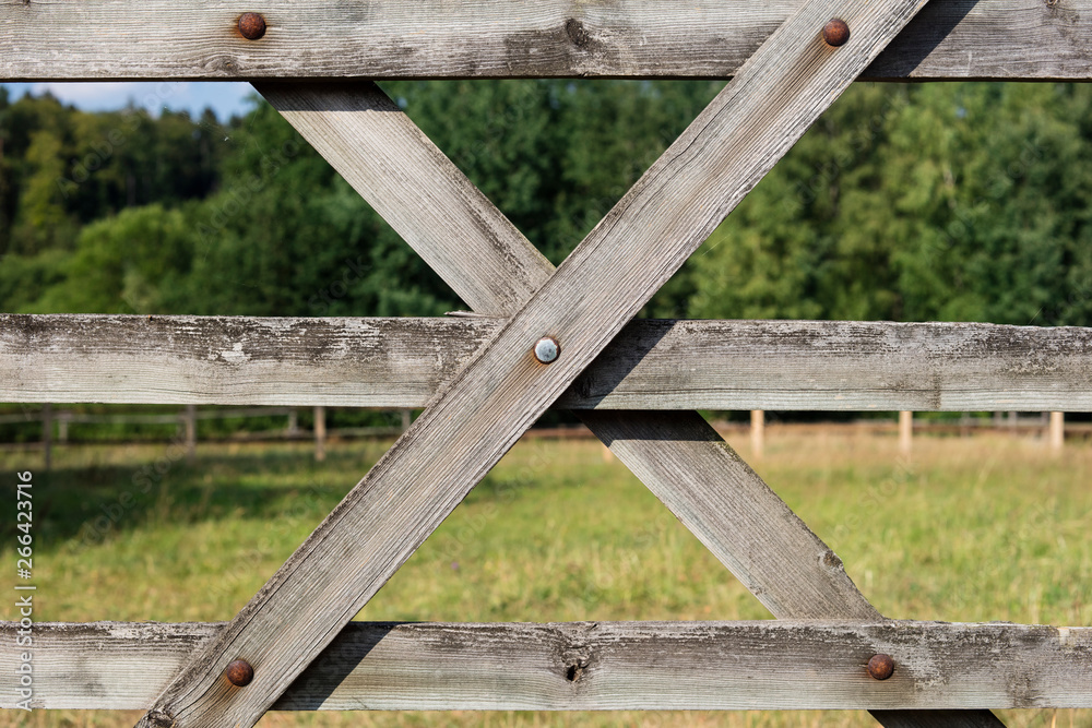 Detail of horse paddock and wooden fence. Detail of horse paddock and wooden fence.