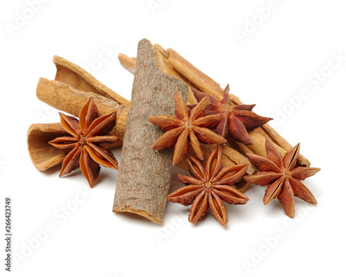 Cinnamon and anise on white background 