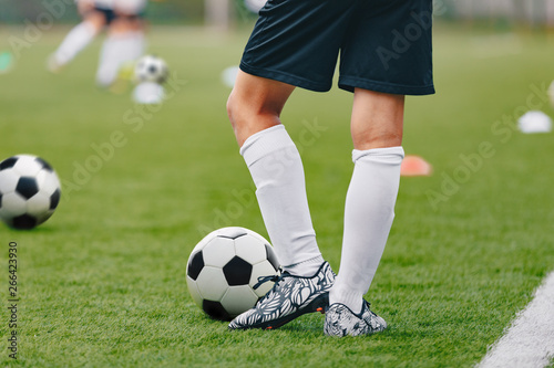 Adult Soccer Training Session. Football Player with Ball on the Field
