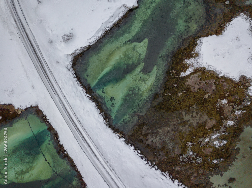 Aerial drone panoramic view of amazing Lofoten Islands. Top view picture at sunset. Winter scenery with famous nordic landscape in Norway, Scandinavia.