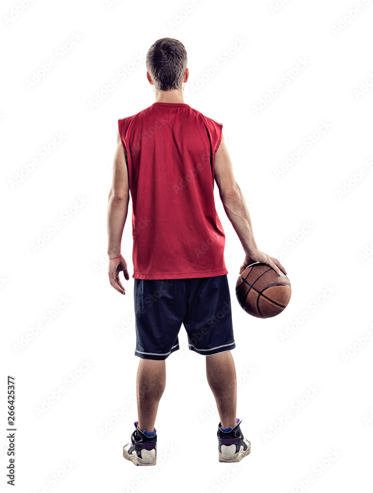 Basketball player standing back to camera with ball in hand isolated on white background Basketball player standing back to camera with ball in hand isolated on white background