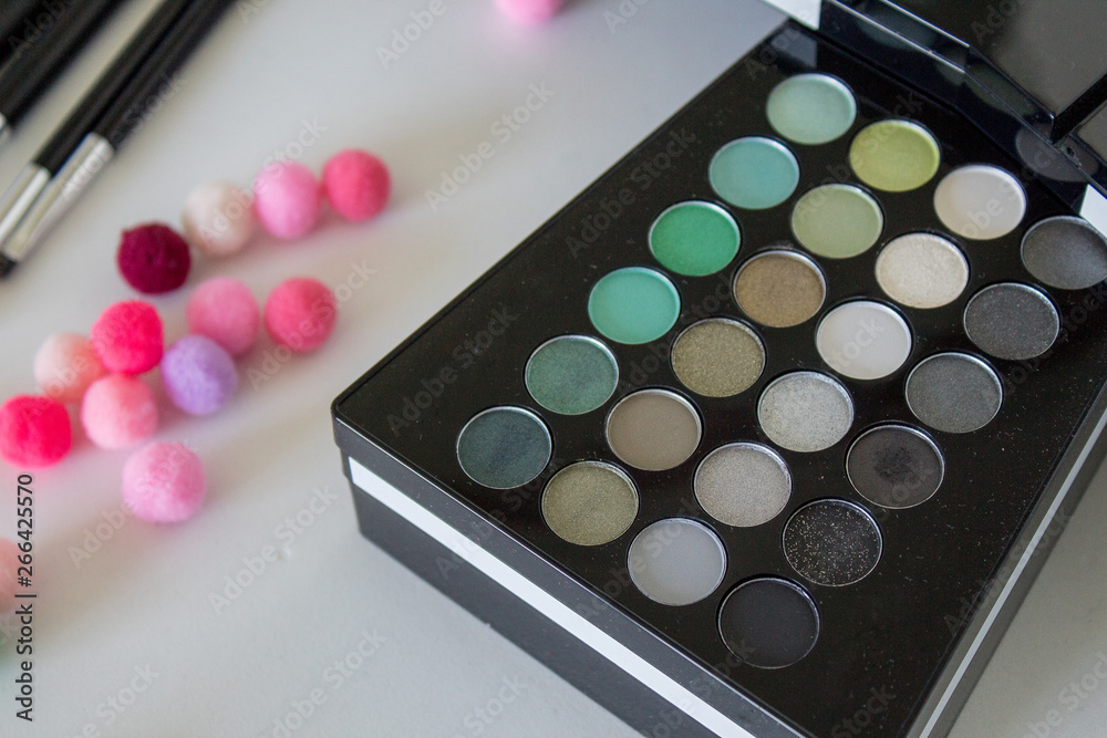 Set of makeup, Eye shadows palette with brush on white background Set of makeup, Eye shadows palette with brush on white background