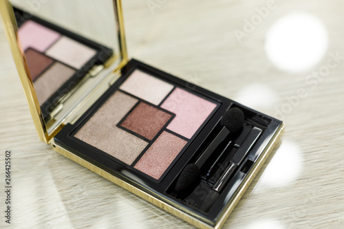 Palette with shadows on the table in the beauty salon photo