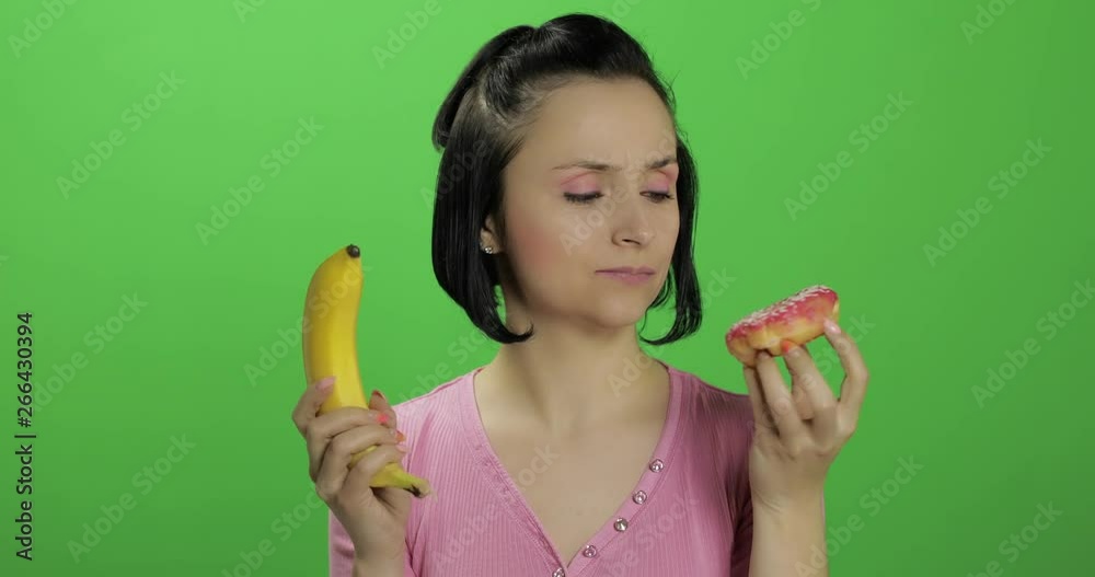 Starting healthy eating. Say no to junk food. Choice donut or banana to eat Starting healthy eating. Say no to junk food. Choice donut or banana to eat
