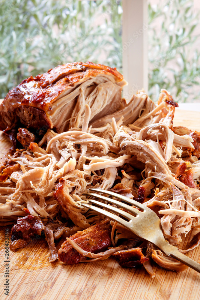 Pulled Pork Roast on Board with Fork