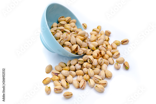 Pistachios in bowls. Roasted pistachio seeds