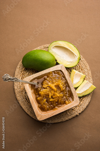 Mango Chunda or Sakhar Amba is a traditional indian summer recipe made using accha aam preserved in sugar syrup for days. selective focus photo