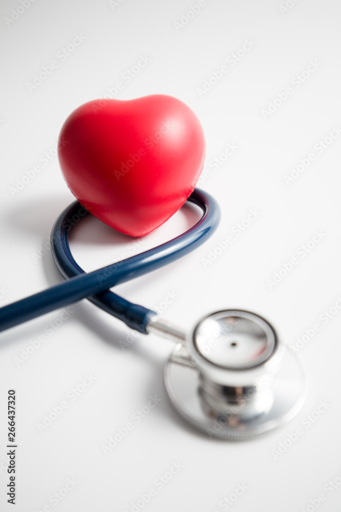 Red heart with stethoscope on white background Red heart with stethoscope on white background