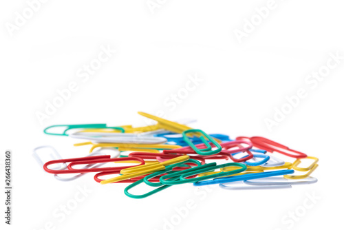 Paper clip in various colors isolated on white background