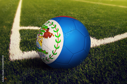 Belize ball on corner kick position  soccer field background. National football theme on green grass.