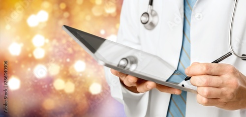 Close-up Doctor at hospital working with tablet pc