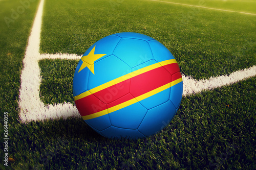 Congo ball on corner kick position  soccer field background. National football theme on green grass.