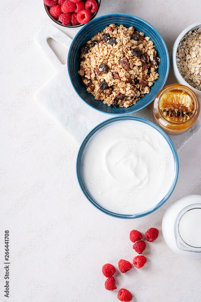 Granola breakfast in ceramic bowl Granola breakfast in ceramic bowl