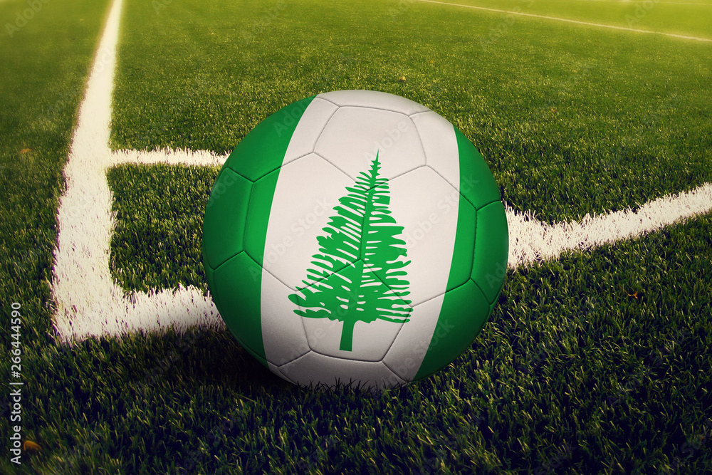 Obraz premium Norfolk Island ball on corner kick position, soccer field background. National football theme on green grass.