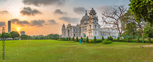 Panoramic view of Victoria Memorial with High rise buildings , at the time of Sunrise.