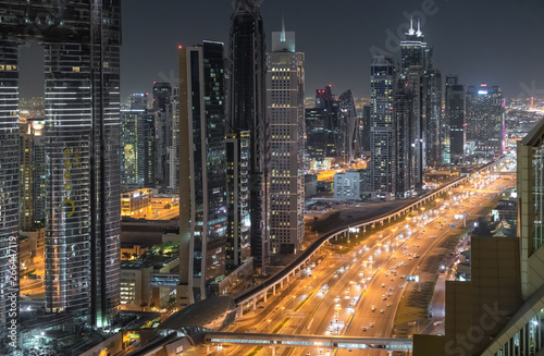 Aerial view of cityscape at night in Dubai.UAE 