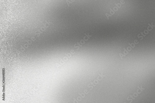 Scratches on silver metal sheet, abstract texture background