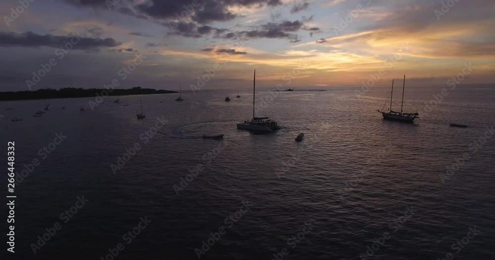 Soft fly over the bay with a stunning sunset full of colors Soft fly over the bay with a stunning sunset full of colors
