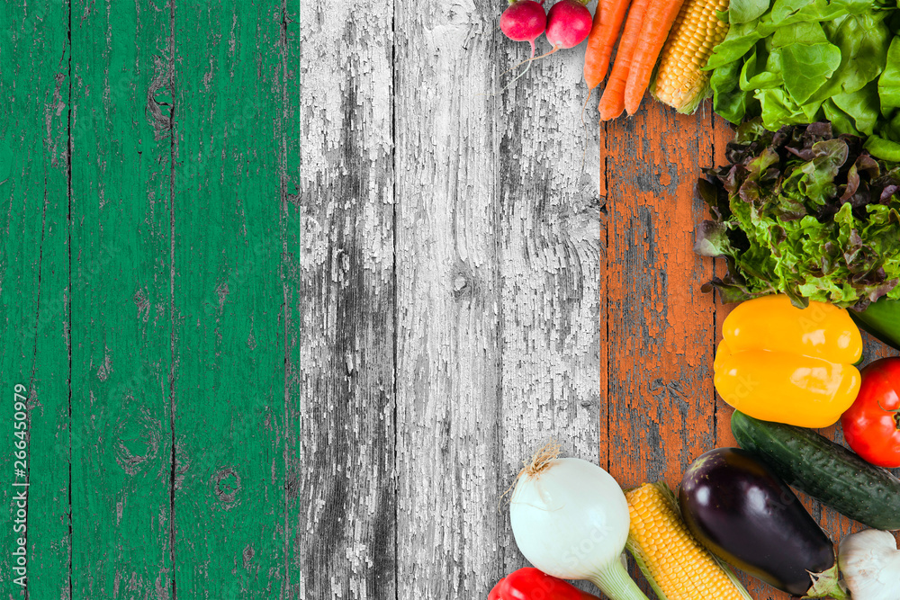 Fresh vegetables from Ireland on table. Cooking concept on wooden flag background. Fresh vegetables from Ireland on table. Cooking concept on wooden flag background.
