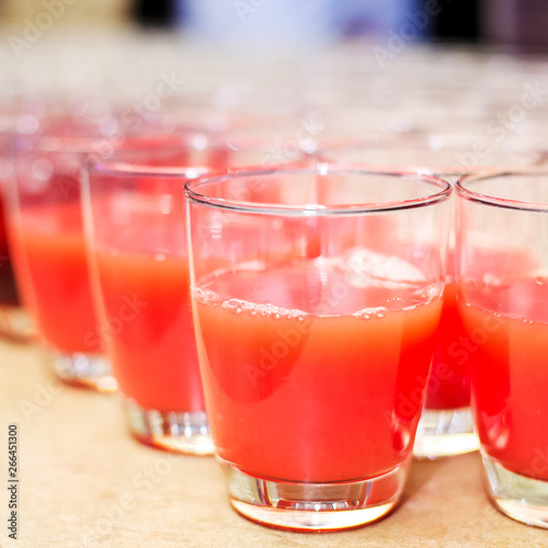 Tomato juice in a row