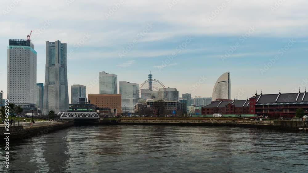 time lapse of Minatomirai, view from the bay in Yokohama city, Japan time lapse of Minatomirai, view from the bay in Yokohama city, Japan