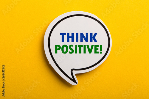 Foto Think Positive Speech Bubble Isolated On Yellow Background