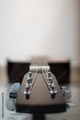 Acoustic guitar headstock closeup  with capstans photo