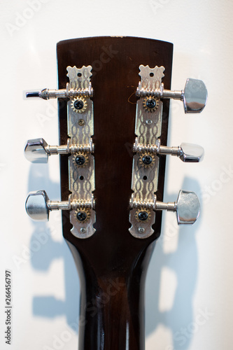 Acoustic guitar headstock closeup  with capstans photo