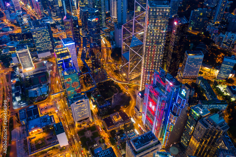 Drone fly over Hong Kong downtown city at night