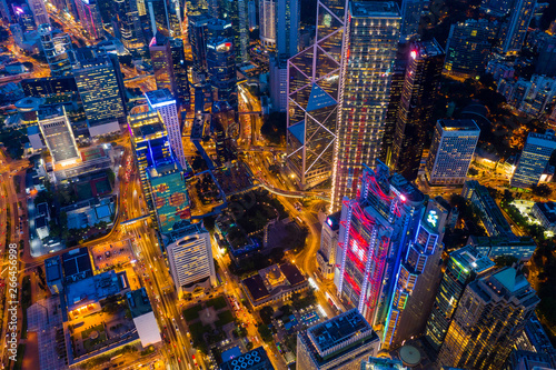 Drone fly over Hong Kong downtown city at night © leungchopan
