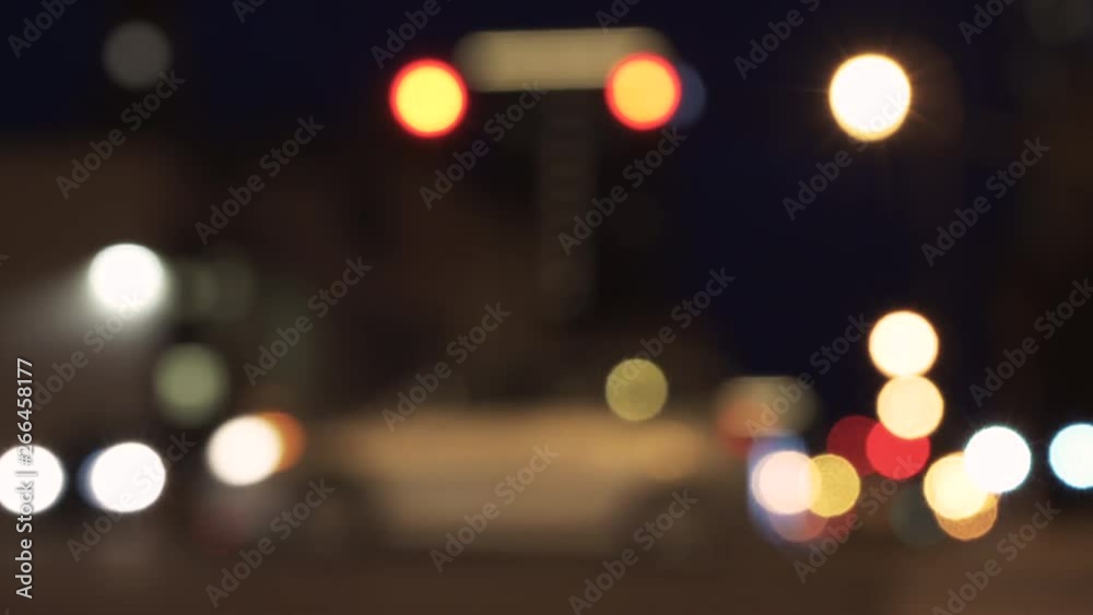 Out of focus traffic, in the city, at night. Out of focus traffic, in the city, at night.