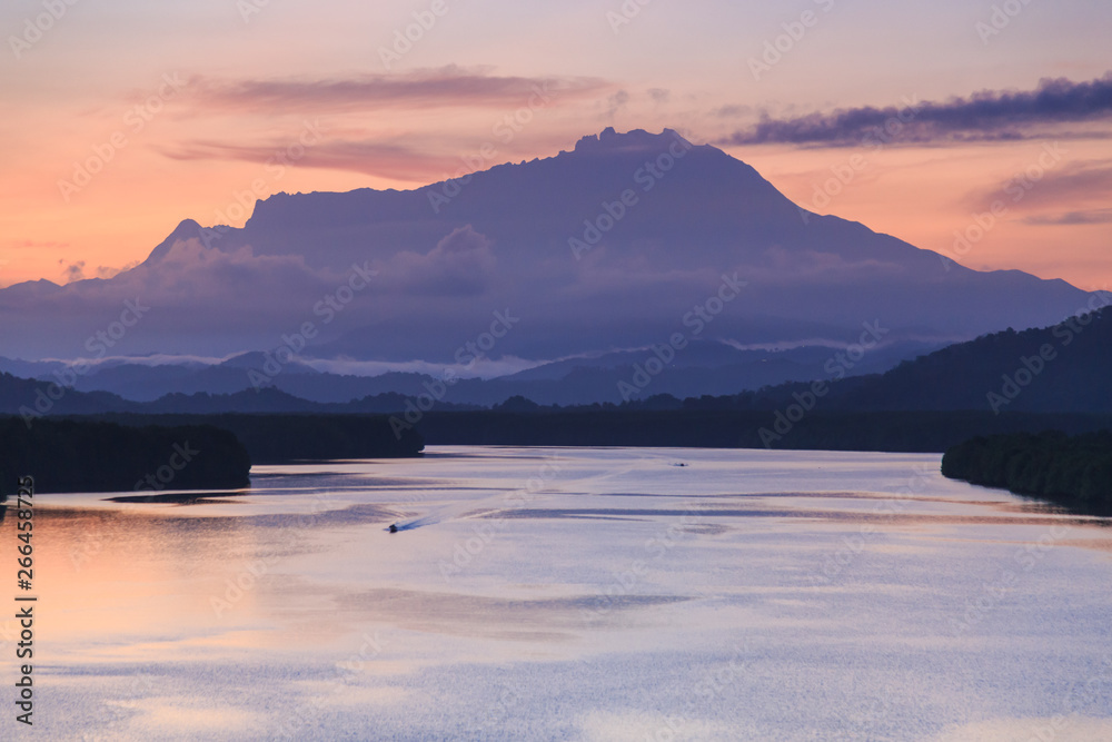 Majestic Mount Kinabalu with beautiful Twilight Sunrise and amazing sky clouds, Tuaran,Sabah,Borneo (Soft Focus)