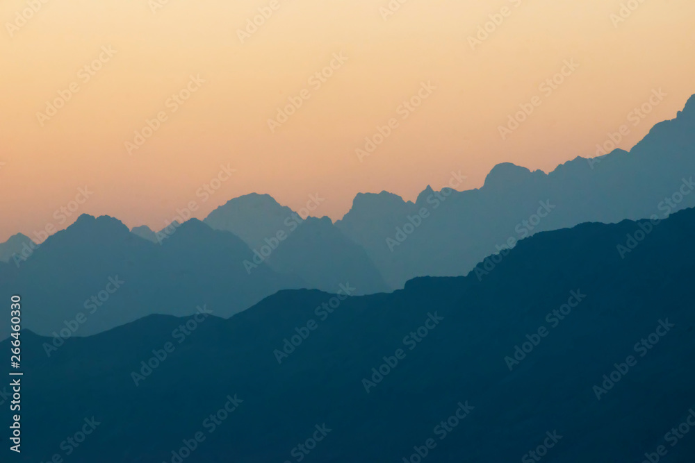 The misty peaks were at sunset