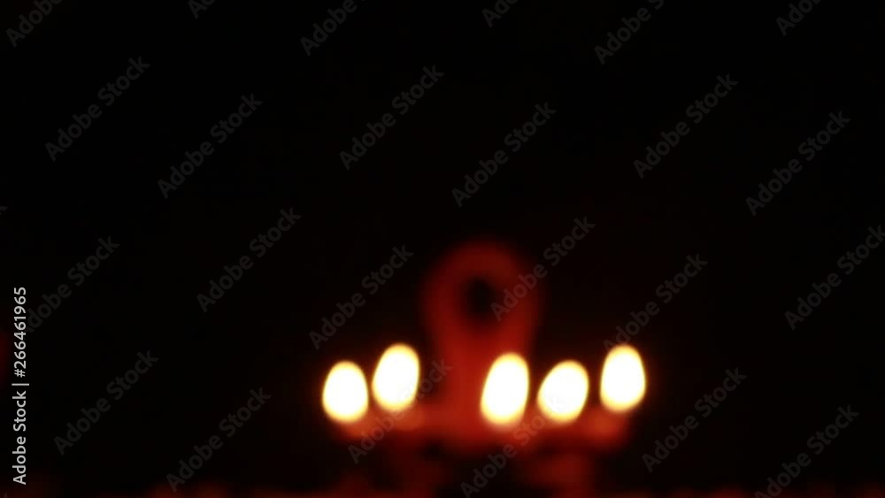 Celebration of festival of lights by lighting mud lamps Celebration of festival of lights by lighting mud lamps