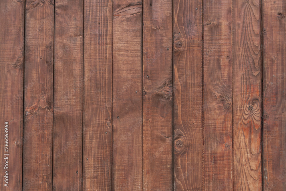 Fototapeta premium Abstract artistic background: plain brown wooden wall.